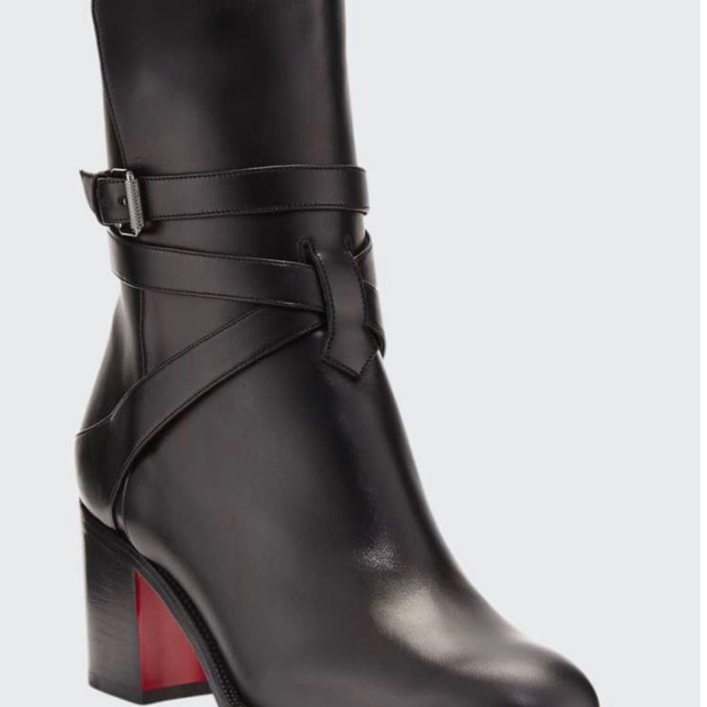 CHRISTIAN LOUBOUTIN “KARISTRAP” BOOTIES.